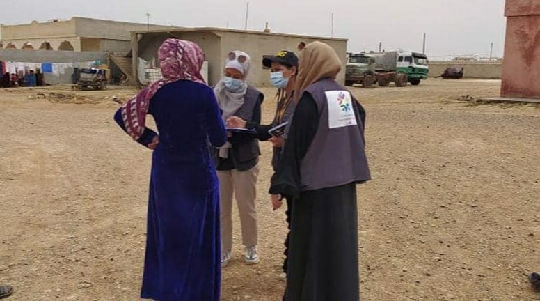 Alwan distributing vitamin boxes to pregnant and lactating women and the elderly