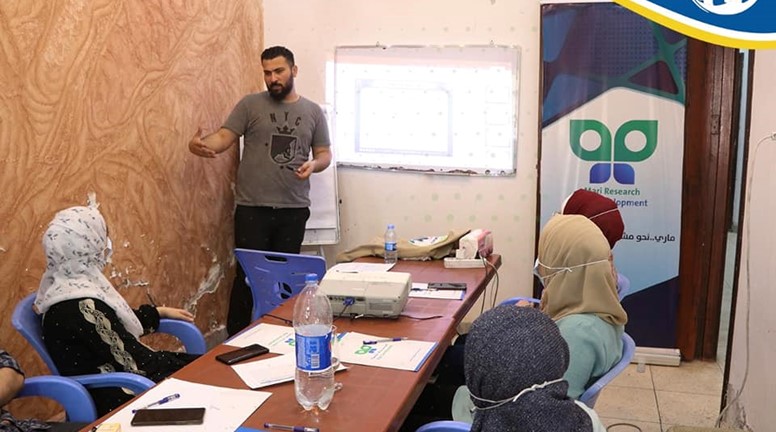 Holding a training workshop on visual identity and its uses in the office of Al-Diyar Association